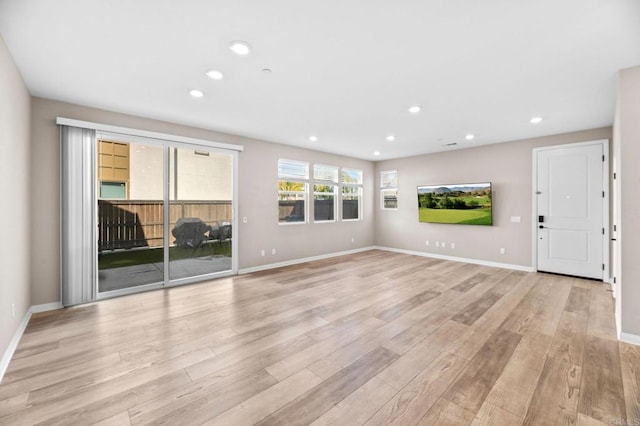 2167 Trevi Cir, Chula Vista, CA 91913 - unfurnished living room featuring light wood-type flooring and recessed lighting