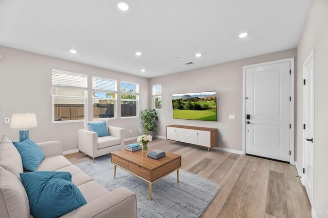 2167 Trevi Cir, Chula Vista, CA 91913 - living room with light wood-type flooring and recessed lighting