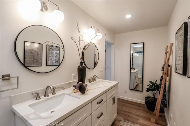 29521 Via, San Sebastian, Laguna Niguel, CA 92677 - full bathroom with double vanity, wood finished floors, recessed lighting, and baseboards