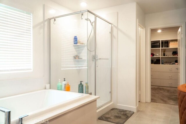 2373 Crater Ave, Rialto, CA 92377 - full bathroom featuring a stall shower, a garden tub, tile patterned flooring, plenty of natural light, and recessed lighting
