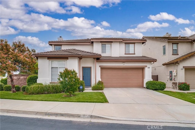 5581 Tremaine Way, Chino Hills, CA 91709 - view of front of property with an attached garage, driveway, stucco siding, and a tile roof