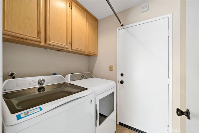 1044 Jude Ct, San Jacinto, CA 92583 - laundry room with washing machine and dryer and cabinet space