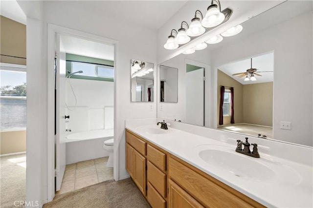 1044 Jude Ct, San Jacinto, CA 92583 - full bath featuring double vanity, toilet, tile patterned flooring, ceiling fan, and shower / bath combination