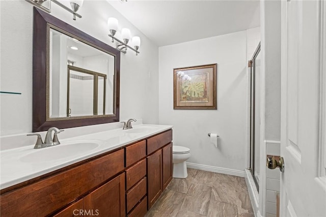 5048 W 121st St, Hawthorne, CA 90250 - full bathroom featuring a stall shower, double vanity, and toilet