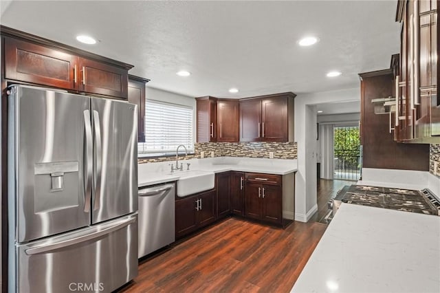 5048 W 121st St, Hawthorne, CA 90250 - kitchen featuring appliances with stainless steel finishes, a sink, dark wood-type flooring, tasteful backsplash, and recessed lighting