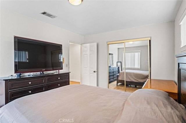 5048 W 121st St, Hawthorne, CA 90250 - bedroom featuring a closet, baseboards, and wood finished floors