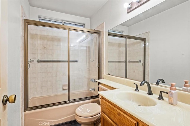 5048 W 121st St, Hawthorne, CA 90250 - full bath featuring toilet, vanity, and bath / shower combo with glass door
