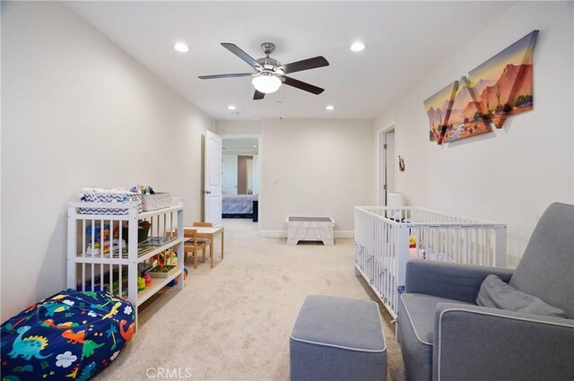 living room featuring ceiling fan, recessed lighting, and carpet