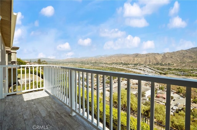 balcony featuring a mountain view