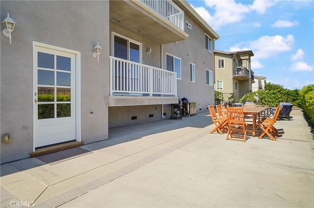 view of patio featuring outdoor dining area