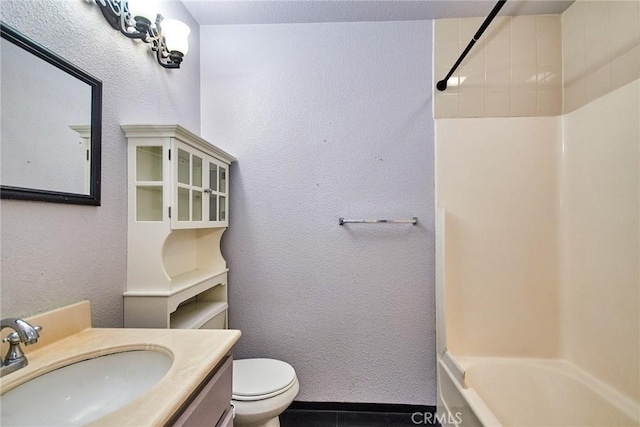 2990 Malaga Cir Unit C, Diamond Bar, CA 91765 - bathroom featuring toilet, tile patterned floors, vanity, shower / bath combination, and a textured wall