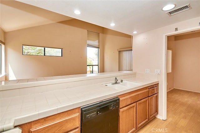 2990 Malaga Cir Unit C, Diamond Bar, CA 91765 - kitchen with dishwasher, light wood finished floors, a sink, recessed lighting, and brown cabinets
