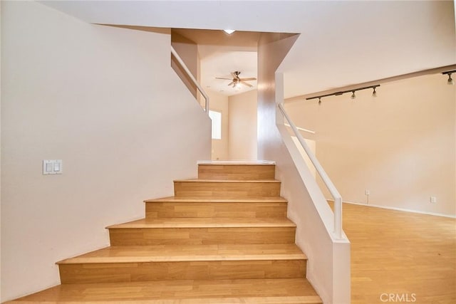 2990 Malaga Cir Unit C, Diamond Bar, CA 91765 - staircase featuring a ceiling fan and wood finished floors