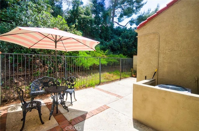 2990 Malaga Cir Unit C, Diamond Bar, CA 91765 - view of patio featuring fence and central AC