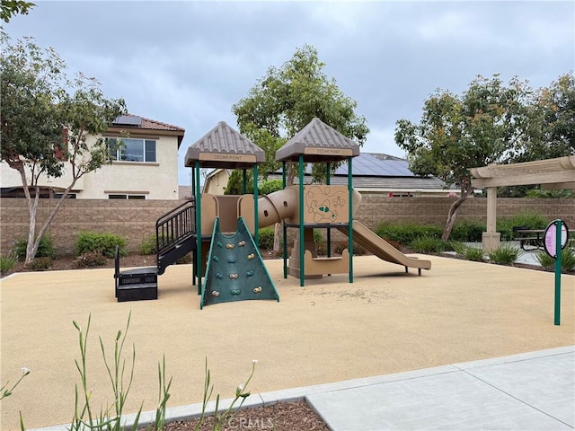 community play area featuring fence
