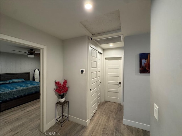 14825 Cranbrook Ave, Hawthorne, CA 90250 - corridor with wood finished floors, baseboards, attic access, and recessed lighting