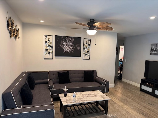 14825 Cranbrook Ave, Hawthorne, CA 90250 - living area featuring recessed lighting, ceiling fan, wood finished floors, and baseboards