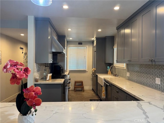 14825 Cranbrook Ave, Hawthorne, CA 90250 - kitchen with baseboards, a sink, wall chimney exhaust hood, stainless steel range with gas cooktop, and recessed lighting