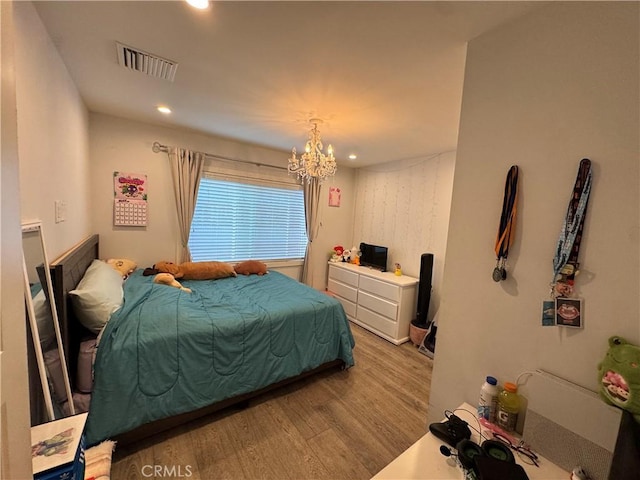 14825 Cranbrook Ave, Hawthorne, CA 90250 - bedroom with wood finished floors, a chandelier, and recessed lighting