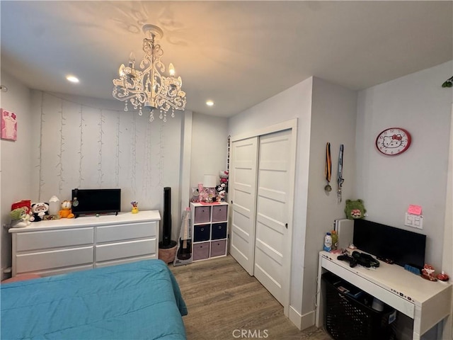14825 Cranbrook Ave, Hawthorne, CA 90250 - bedroom featuring wood finished floors, a closet, a chandelier, and recessed lighting