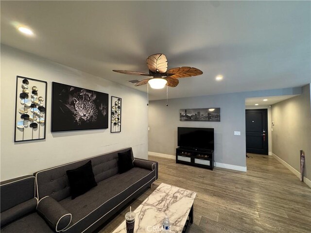 14825 Cranbrook Ave, Hawthorne, CA 90250 - living room featuring a ceiling fan, wood finished floors, baseboards, and recessed lighting