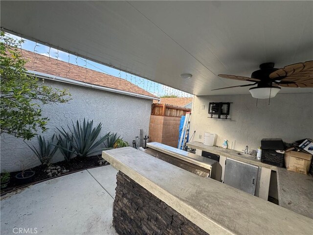 14825 Cranbrook Ave, Hawthorne, CA 90250 - view of patio with area for grilling, fence, ceiling fan, and a sink