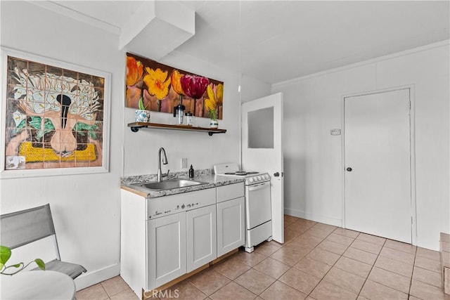 641 Sunnyhill Dr, Los Angeles, CA 90065 - kitchen with white gas range, a sink, open shelves, light tile patterned floors, and light countertops