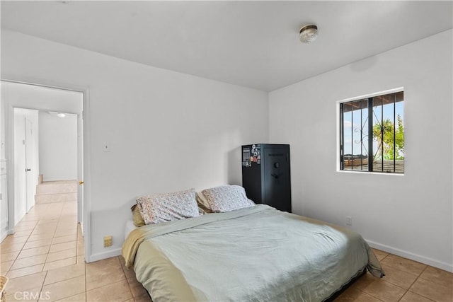 641 Sunnyhill Dr, Los Angeles, CA 90065 - bedroom with light tile patterned floors and baseboards