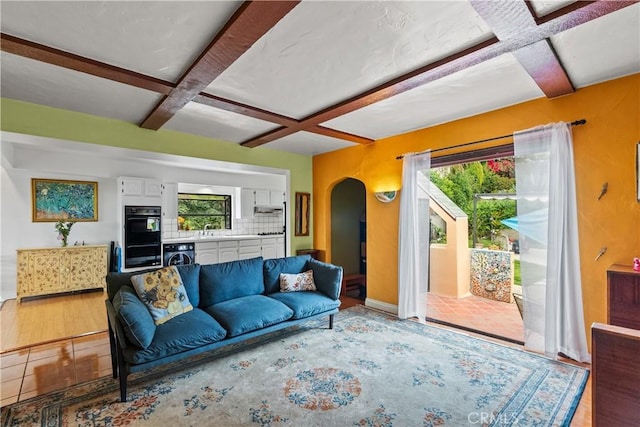 641 Sunnyhill Dr, Los Angeles, CA 90065 - living area with coffered ceiling, arched walkways, beamed ceiling, and baseboards