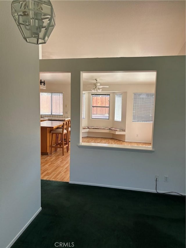 5314 Carlo Ct, Palmdale, CA 93552 - unfurnished living room with a ceiling fan and carpet floors