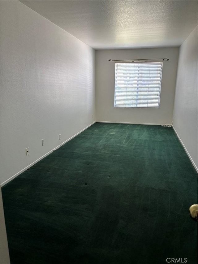 5314 Carlo Ct, Palmdale, CA 93552 - carpeted empty room featuring baseboards and a textured ceiling