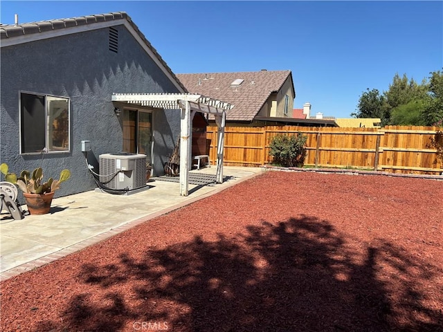 5314 Carlo Ct, Palmdale, CA 93552 - back of property featuring a pergola, stucco siding, a fenced backyard, and a patio area