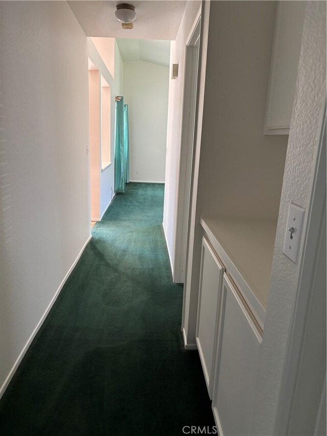 5314 Carlo Ct, Palmdale, CA 93552 - corridor featuring dark carpet and baseboards