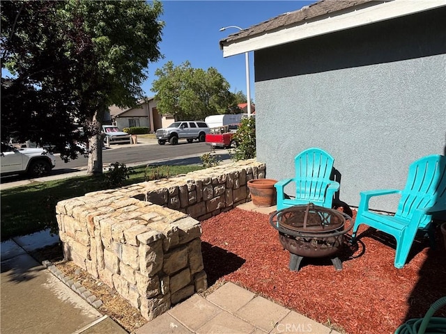 5314 Carlo Ct, Palmdale, CA 93552 - view of patio / terrace with a fire pit