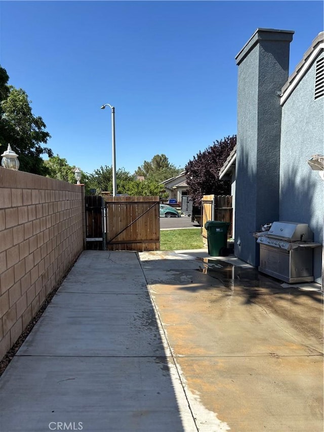 5314 Carlo Ct, Palmdale, CA 93552 - view of patio / terrace featuring a gate and area for grilling