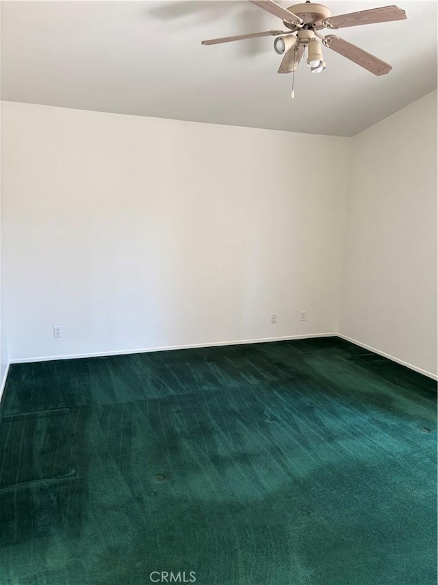 5314 Carlo Ct, Palmdale, CA 93552 - empty room featuring dark carpet and a ceiling fan