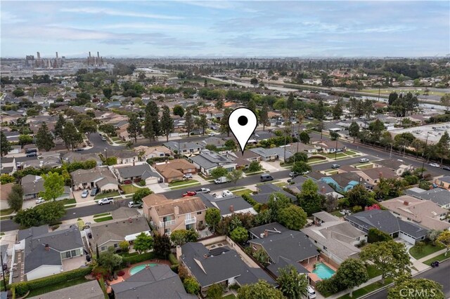 aerial view of property's location featuring nearby suburban area
