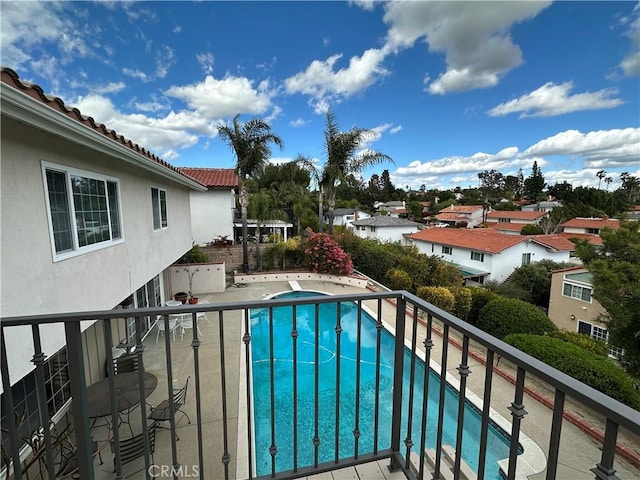 11806 Thunderbird Ave, Porter Ranch, CA 91326 - balcony featuring a patio area, view of pool area, a hot tub, and a residential view