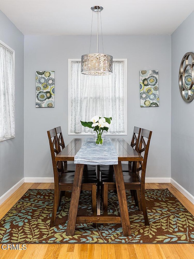 5627 Huddart Ave, Arcadia, CA 91006 - dining area with baseboards and wood finished floors
