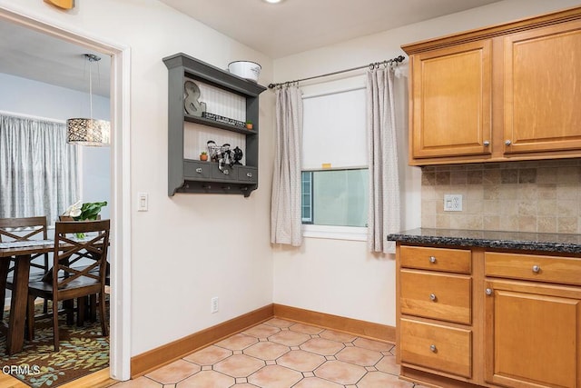 5627 Huddart Ave, Arcadia, CA 91006 - kitchen with tasteful backsplash, dark stone counters, brown cabinets, and open shelves