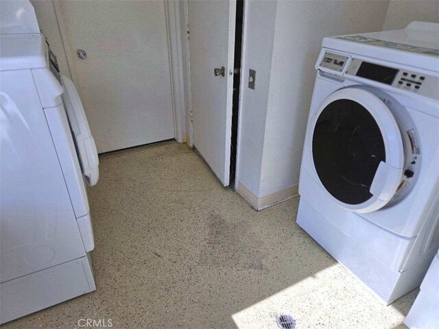 washroom featuring washer / dryer