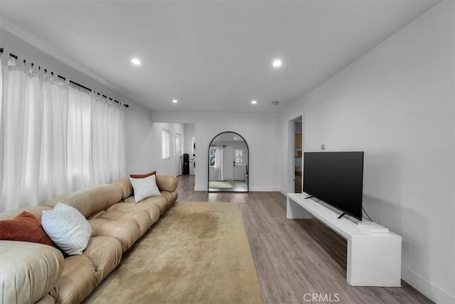 354 E 111th St, Los Angeles, CA 90061 - living room featuring recessed lighting, wood finished floors, and baseboards