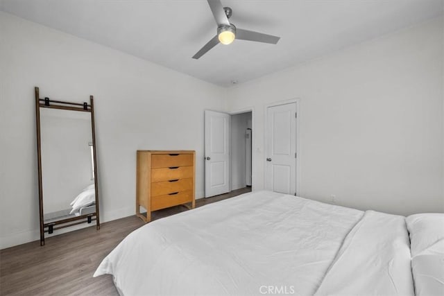 354 E 111th St, Los Angeles, CA 90061 - bedroom with wood finished floors and a ceiling fan