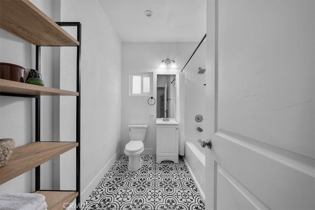 354 E 111th St, Los Angeles, CA 90061 - full bathroom with toilet, shower / bathtub combination, baseboards, and vanity