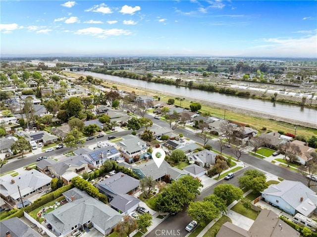 6911 E 10th St, Long Beach, CA 90815 - aerial view of residential area with a nearby body of water and a notable bridge