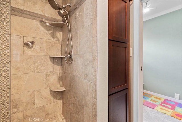 6911 E 10th St, Long Beach, CA 90815 - bathroom featuring tiled shower and crown molding