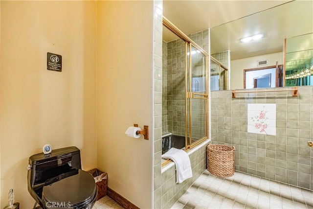 full bathroom with tile patterned floors and baseboards