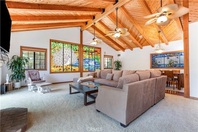 living area featuring wood ceiling, light carpet, beamed ceiling, healthy amount of natural light, and high vaulted ceiling