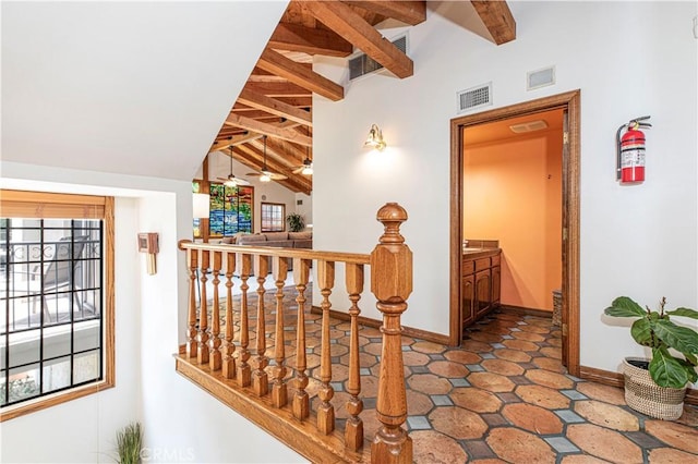 hallway featuring baseboards