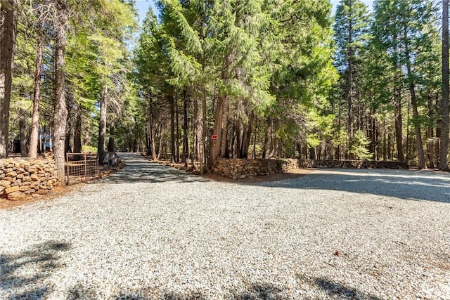 8269 Lost Mill Rd, Shingletown, CA 96088 - view of road featuring a wooded view